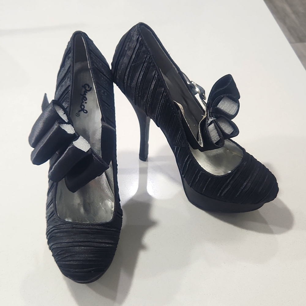 Black high heels with shoe strap